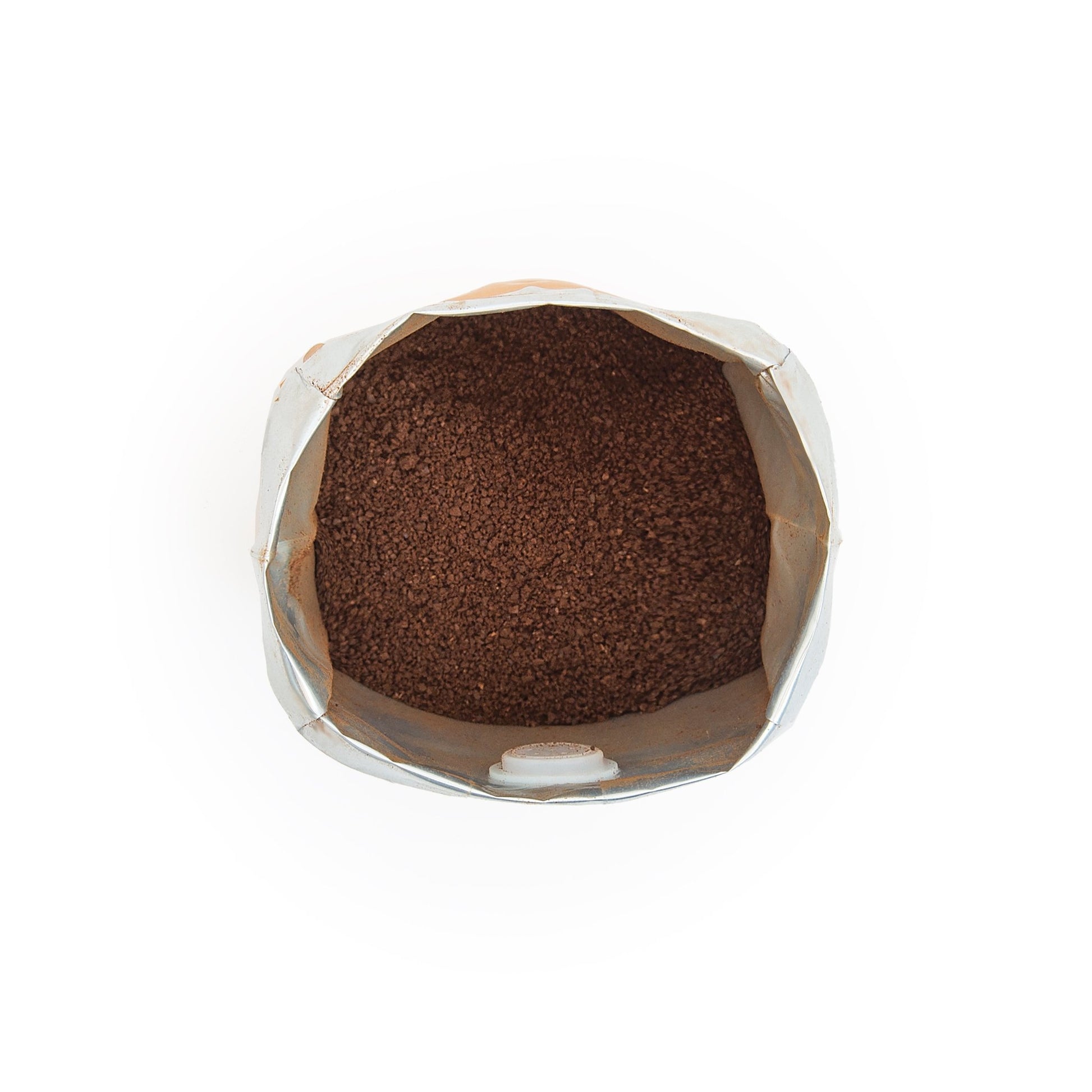 Close-up of Aldebaran Drip ground coffee showing fine texture for filter and drip brewing.