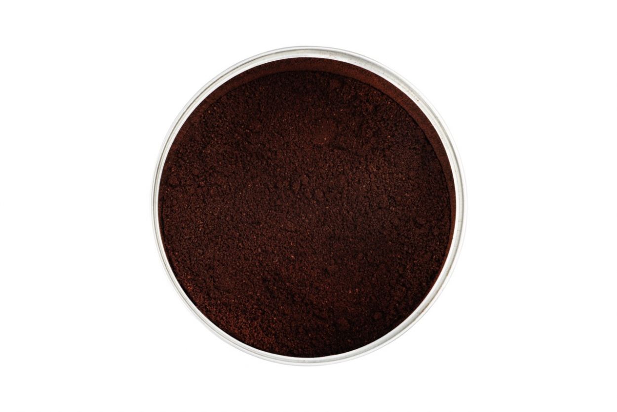 Close-up of Bio moka ground coffee showing medium-fine grind ideal for moka pot brewing.