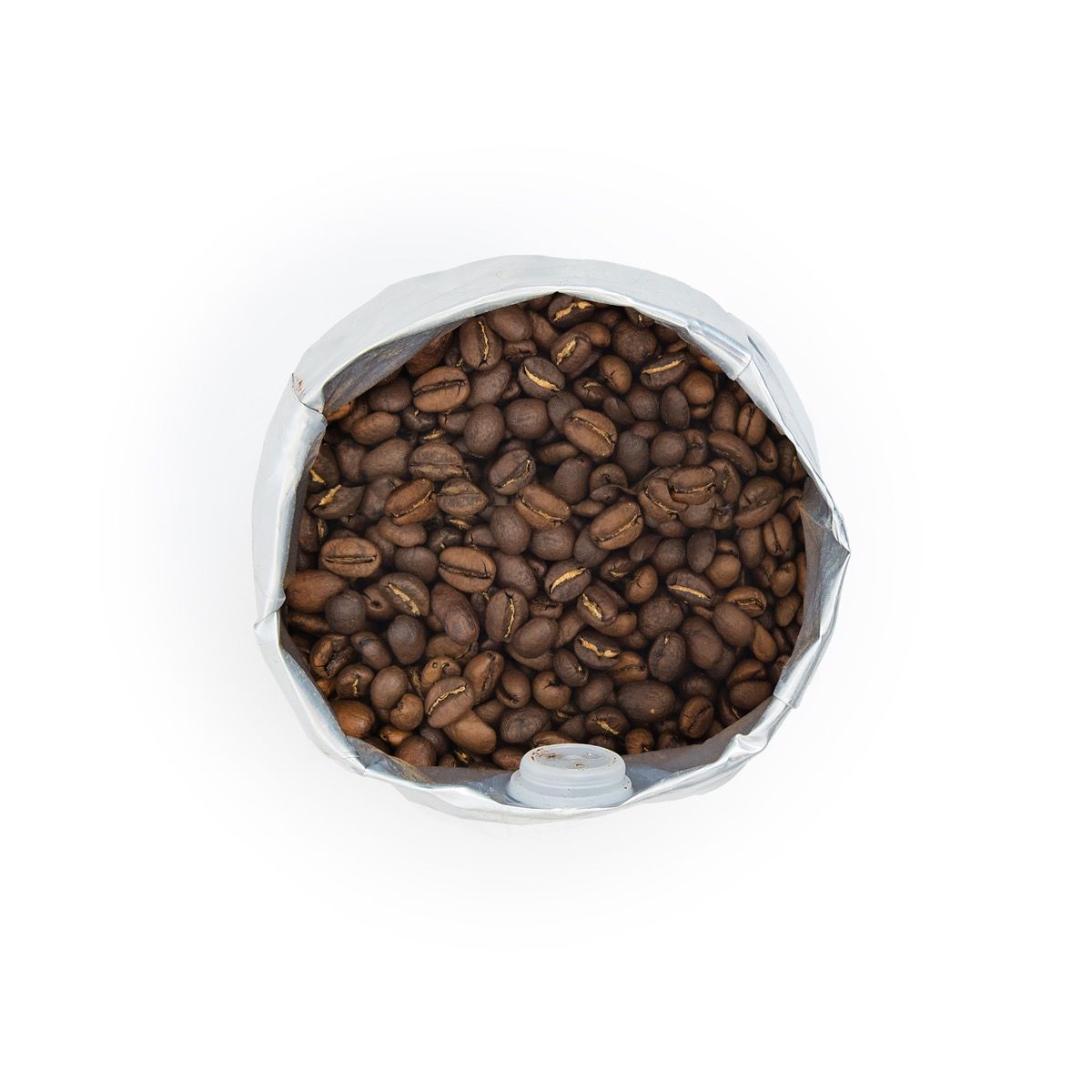 Close-up of MOGI Lady Blue Beans whole coffee beans showing rich texture and glossy surface.